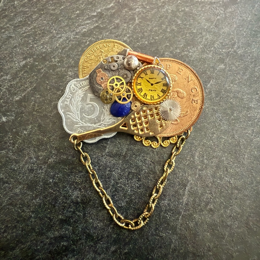 Vintage clockwork brooch